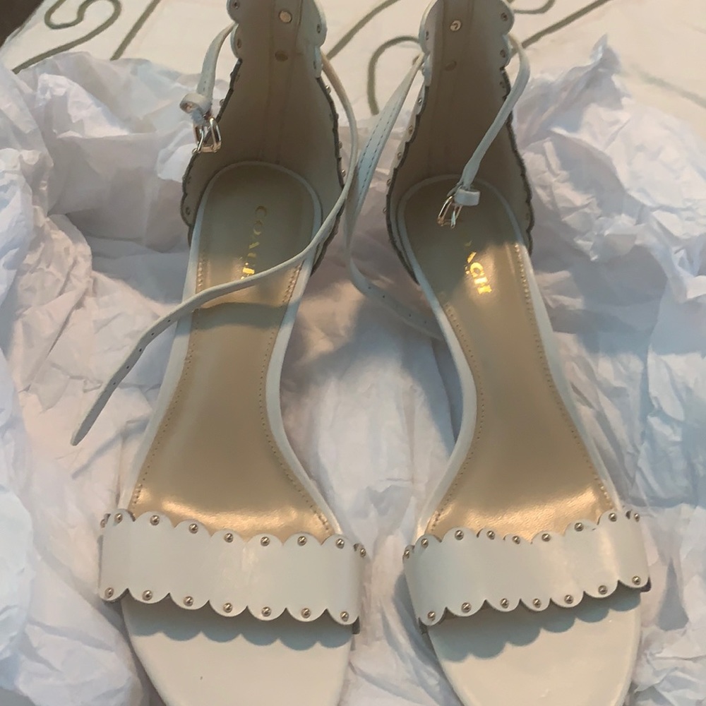 Coach cream heels.